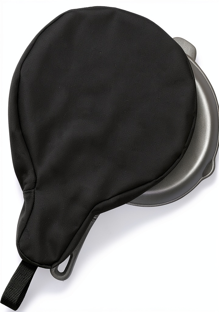 Skillet storage bag hanging from a backpack on a campsite